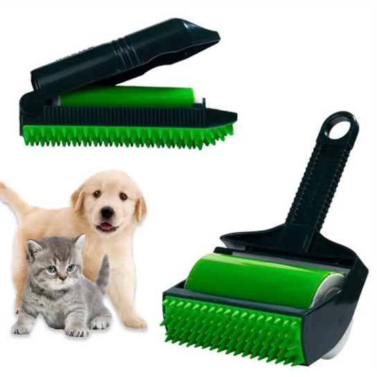 Two green and black rollers, one with its cover open and one standing upright, beside a golden puppy and a grey kitten